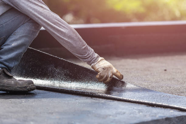 Professional Basement Waterproofing technician working in Alexandria, KY